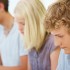 Closeup of young people studying_small