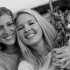 Girlfriends Holding Flowers